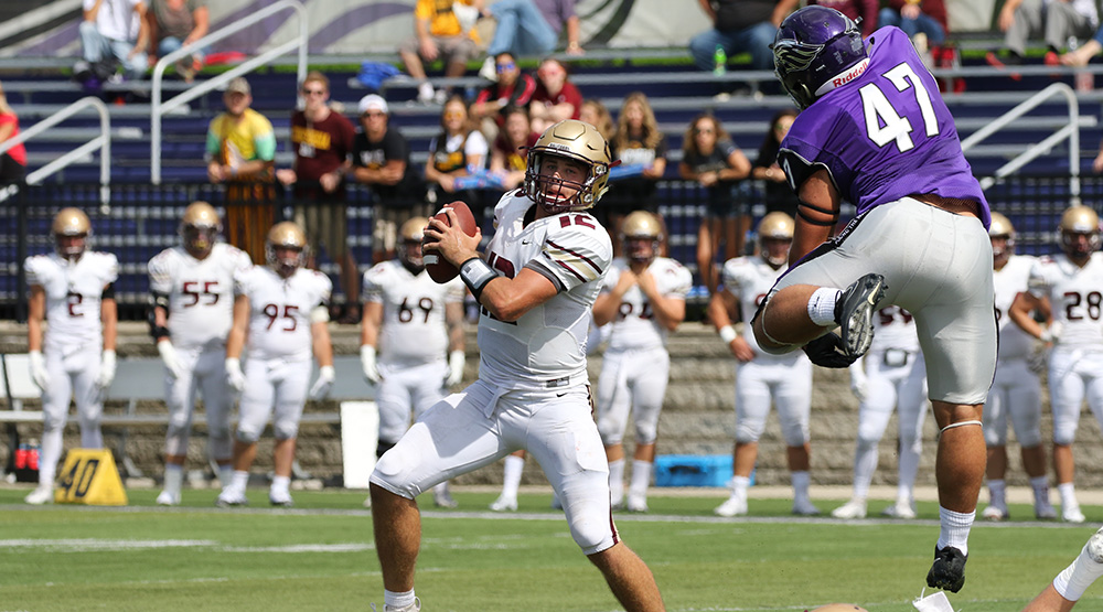 UW-Whitewater linebacker Jacob Erbs leaps over a would-be blocker en route to the Concordia-Moorhead quarterback. (Photo by Daryl Tessmann, d3photography.com)